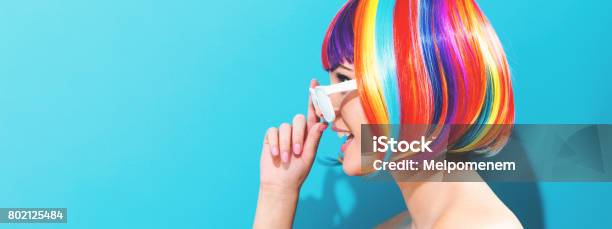 Beautiful Woman In A Colorful Wig Stock Photo - Download Image Now - Multi Colored, Hair, Rainbow
