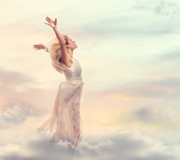 istock Beautiful woman standing with arms wide open 802127526