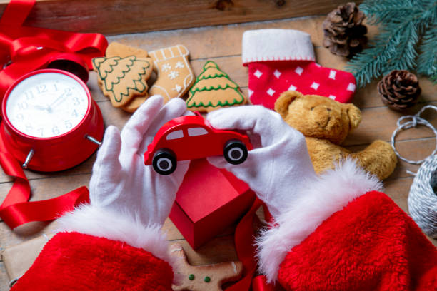 istock Santa Claus have wrapping a Christmas cookie 802133788