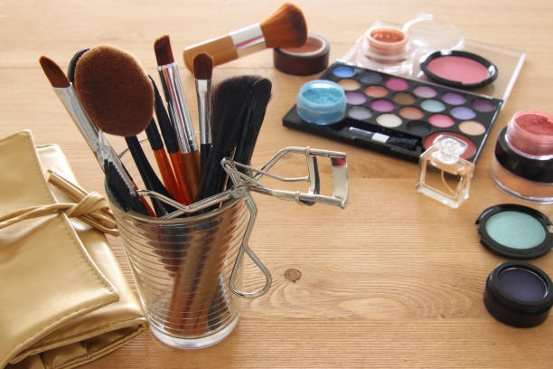 istock makeup cosmetics beauty tools and brushes on wooden background 802149056