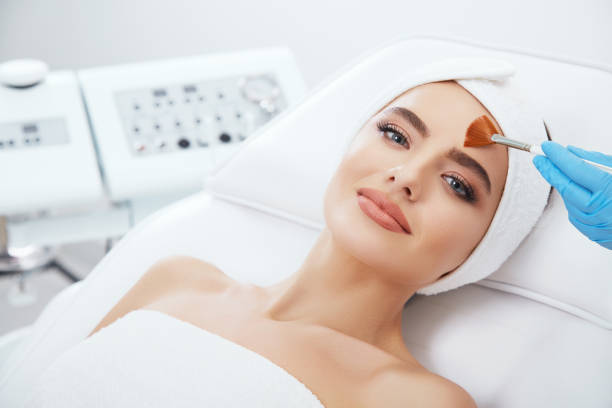 istock Cute girl doing cosmetic procedure 802153778