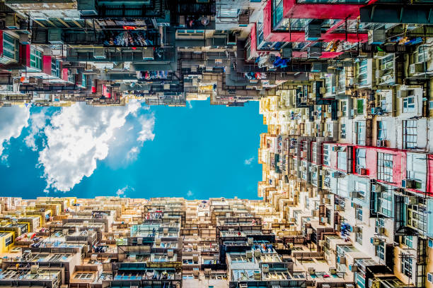 istock Looking up at old building to sky in perspective view 802166598
