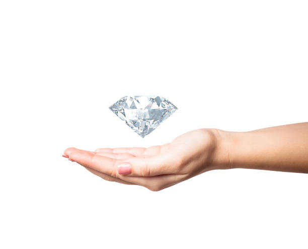 istock woman hand holding 3d diamond over white background 802171768