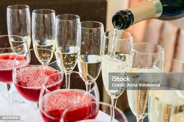 Bartender Pouring Champagne Into Glass Stock Photo - Download Image Now - Champagne, Wine, Corporate Business