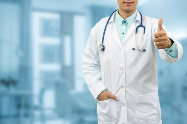istock Doctor Showing Thumbs Up Hand Gesture 802195604