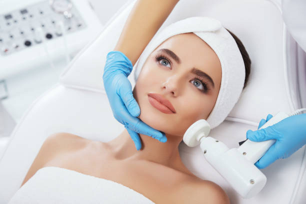 istock Beautiful girl with nude make up doing cosmetic procedure 802195740