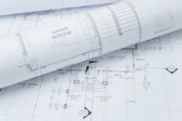 istock architectural drawing paper rolls of a dwelling for construction 802222948