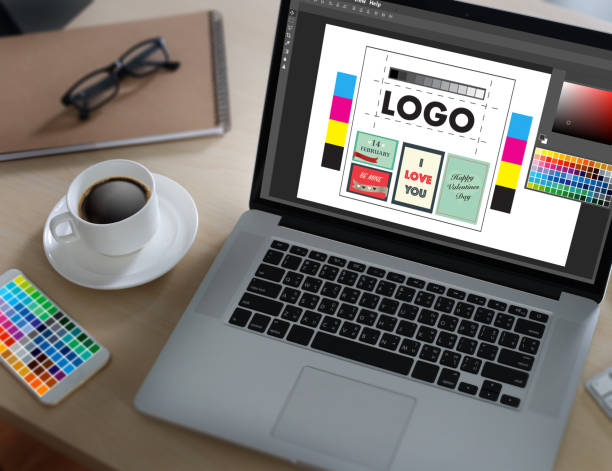 istock Creative Designer Graphic at work. Color swatch samples, Illustrator Graphic designer working digital tablet and computer 802231276