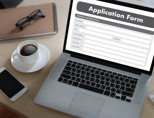 istock business man working on laptop computer use Online Web Job Application Form moniter 802231302