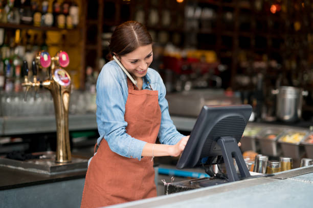 istock Waitress talking on the phone at a restaurant 802236814