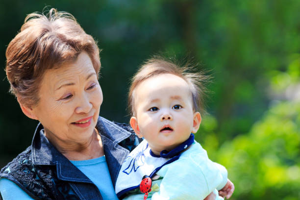 istock Cute baby and the elderly 802237228