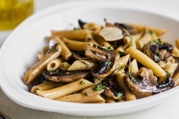 istock Penne with Button Mushroom in Herb sauce 802247458