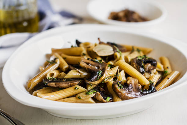 istock Penne with Button Mushroom in Herb sauce 802247522