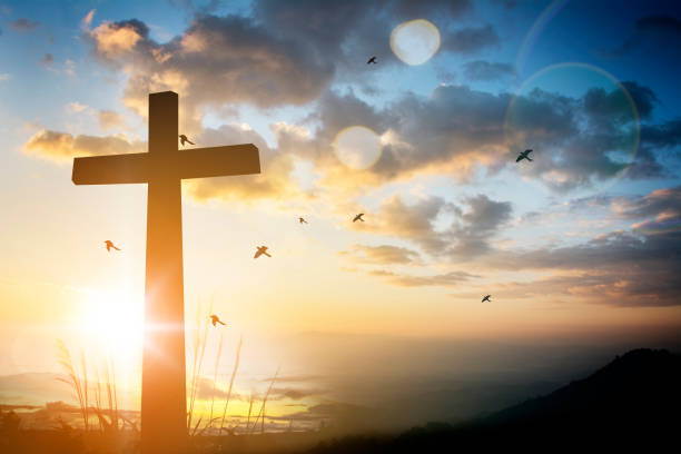 cross cross on blurry sunset background . orthodox church photos stock pictures, royalty-free photos & images