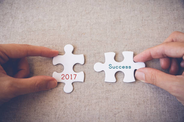 istock Hands with puzzle pieces and 