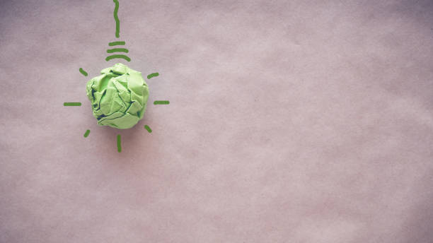 Green paper light bulb, eco energy saving concept