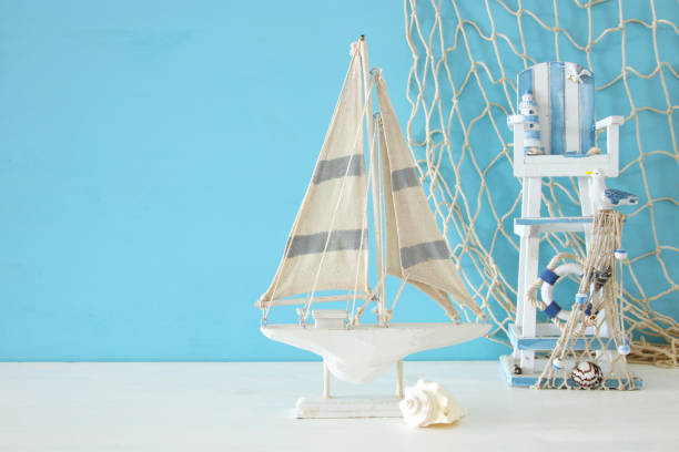 istock Nautical concept with sea life style objects on wooden table 802255870