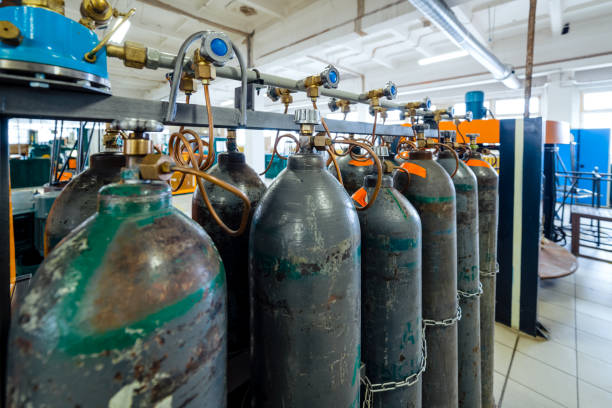 istock Rows of gray gas cylinders 802266924