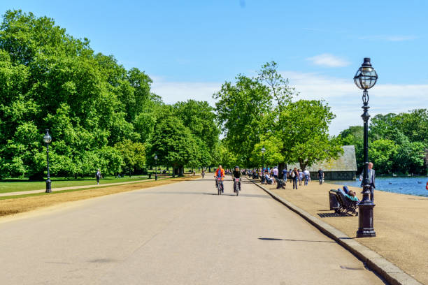 Canada Memorial in Green Park in City of Westminster, London. It was designed by the Canadian sculptor Pierre Granche and completed in 1992.  A man walks near the monument.