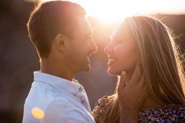 istock Young couple in love outdoor. 802278286
