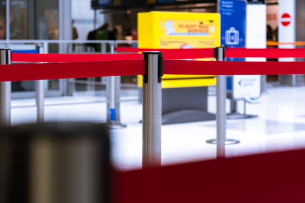 istock Airport Security Rope Lines Waiting Snaking Maze Empty Check In Gate 802279108