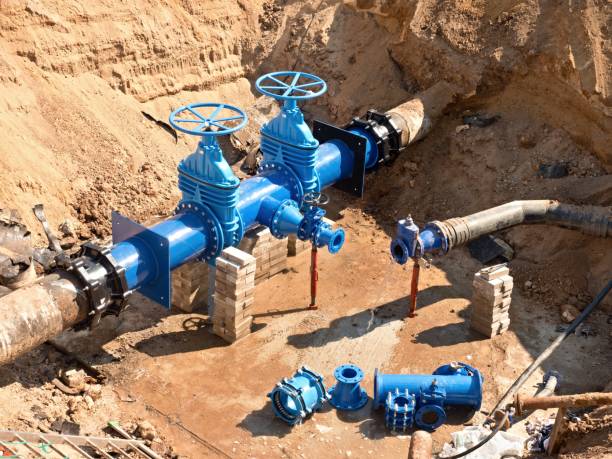 Drink Water Factory. Renewal underground pipelines, valve gates and metal pipes. stock photo