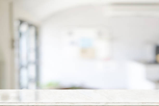 istock Empty marble top table with blurred coffee shop interior Background. f 802290778