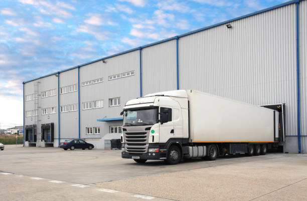 istock Truck in warehouse 802293928