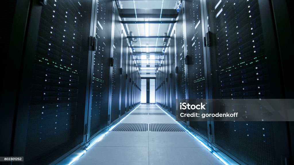 Shot of a Working Data Center With Rows of Rack Servers. Bank - Financial Building Stock Photo