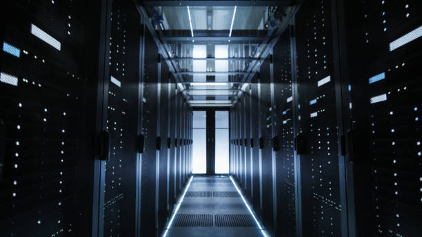 istock Shot of a Corridor in Large Working Data Center Full of Rack Servers and Supercomputers. 802301426