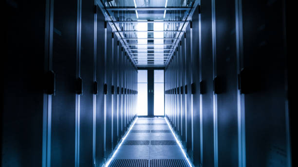 istock Shot of Corridor in Large Working Data Center Full of Rack Servers and Supercomputers. 802301574