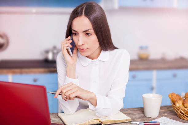 istock businesswoman working at home 802326202
