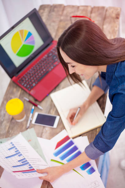 istock young businesswoman working 802326690