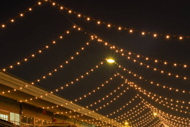 istock String of Light bulb decor in outdoor party. 802326790