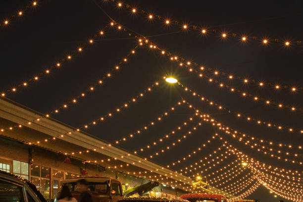 istock String of Light bulb decor in outdoor party. 802329724