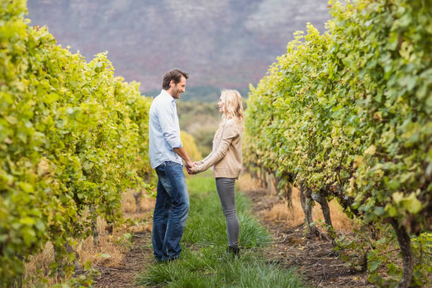 istock Young happy couple holding hands 802334134