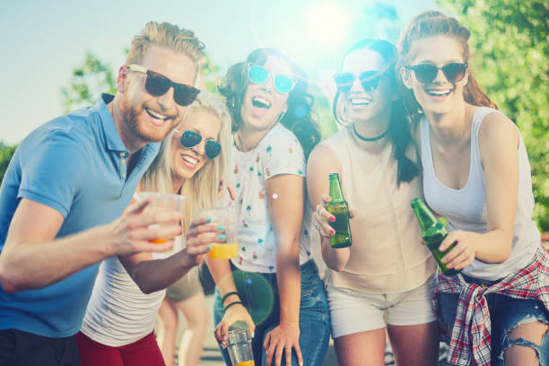 istock Friends partying outdoors 802334192