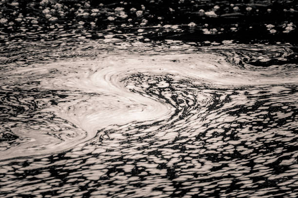 istock An abstract, monochrome pattern of river surface. Van Gogh style. 802334614
