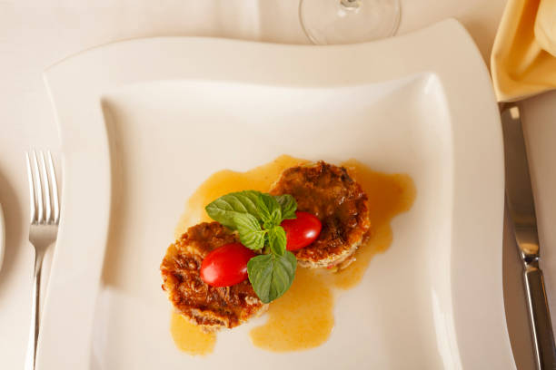 istock Moussaka arranged on a plate, Traditional dish in elegant setting, Selective focus with soft light 802341640