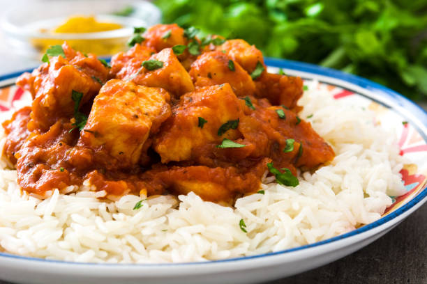 istock Chicken tikka masala with rice 802342318