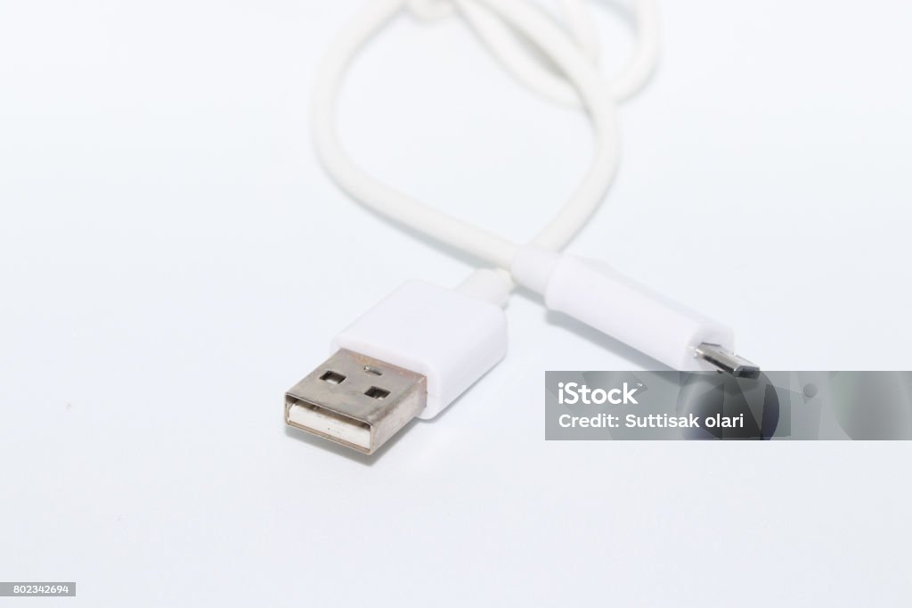 White micro USB cable for android isolated on white background Connectors smartphone recharge supply Biological Cell Stock Photo White micro USB cable for android isolated on white background Connectors smartphone recharge supply Biological Cell Stock Photo