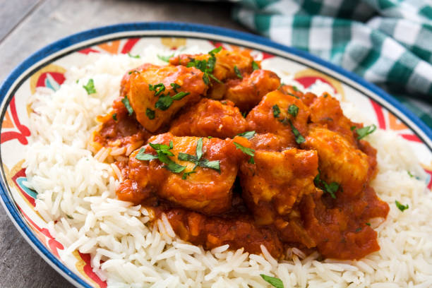 istock Chicken tikka masala with rice 802345156