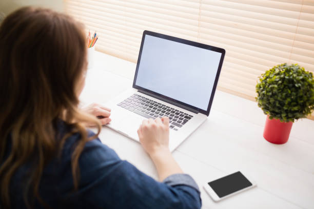 istock Hipster businesswoman using her laptop 802363014