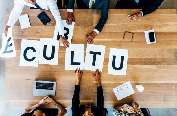 istock Business people discussing over work culture in office 802377962