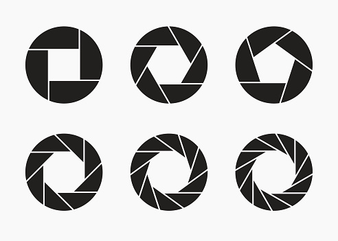 Set of black camera lens aperture icons isolated on light background. Camera objective icon. Shutter icon. Focus icon. Zoom objective for photographer. Simple diagrams set. Vector illustration.