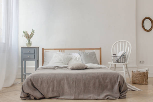 istock Interior of white and gray cozy bedroom 802380568
