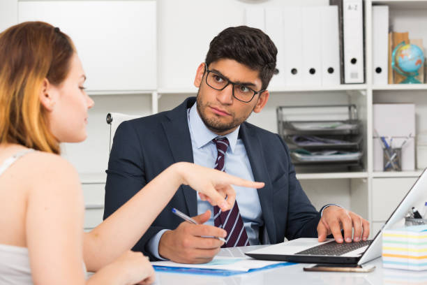 istock Businessman with female client 802380724