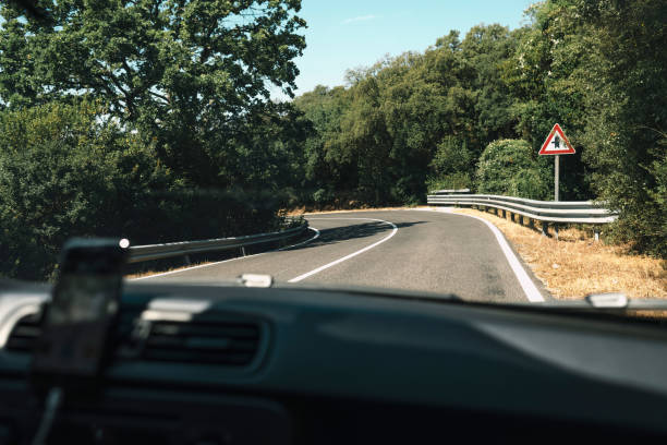 istock On the road during summer vacation seen through windshield. 802381366