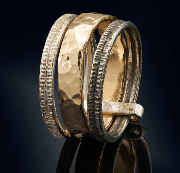 istock beautiful Golden ring isolated on black background 802410290