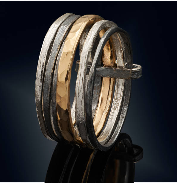istock beautiful Golden ring isolated on black background 802413526